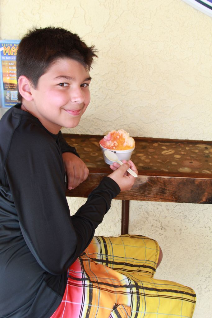 Cody with gummy worms on bottom and POG & Shark's Blood on top.