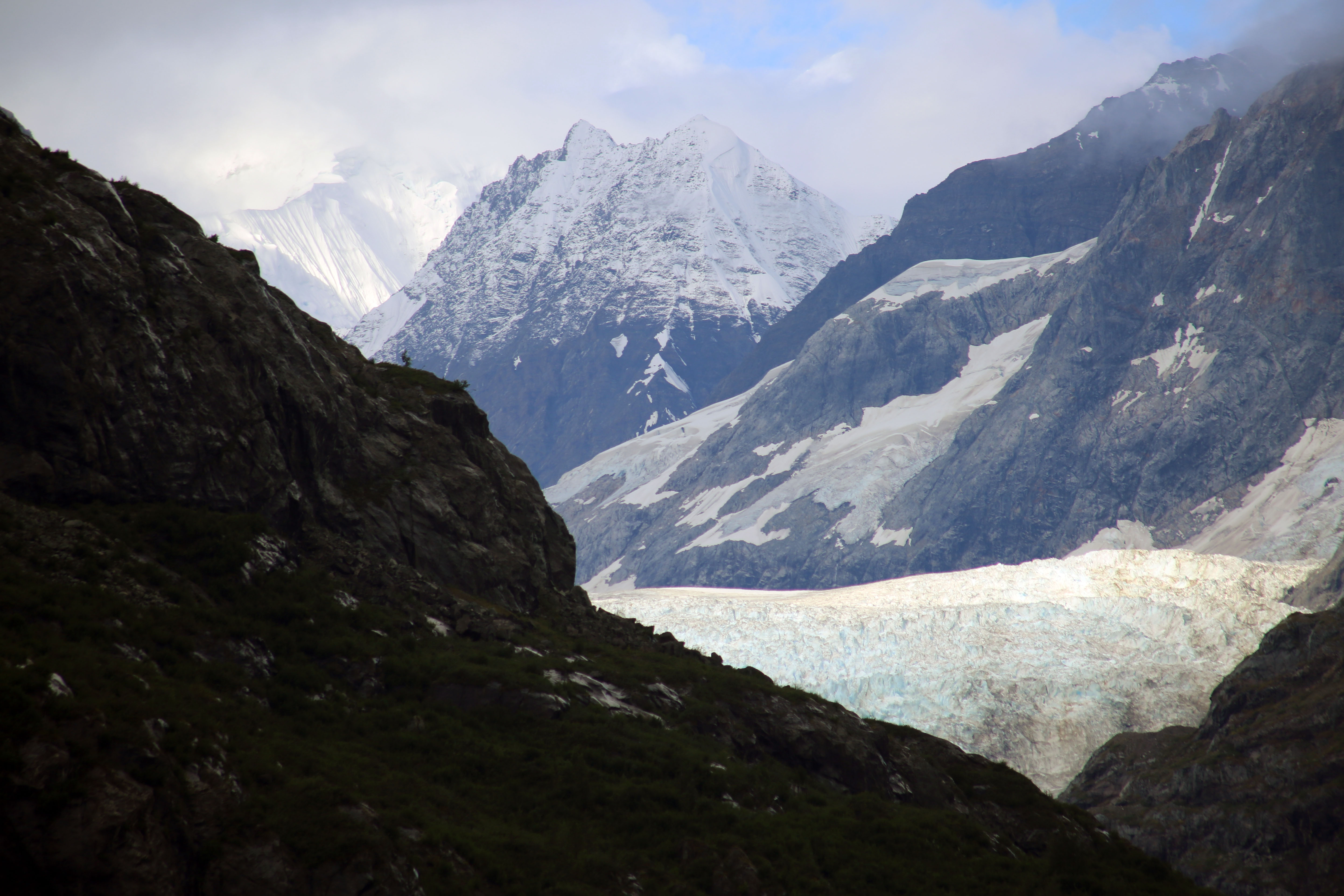 Margerie Glacier framed by rugged mountains in Glacier Bay.